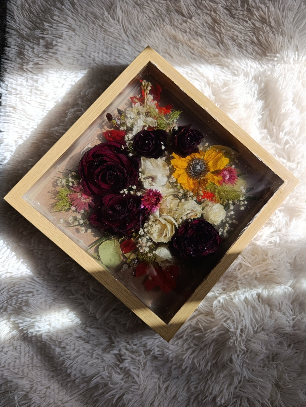 Bouquet inglobato in cornice